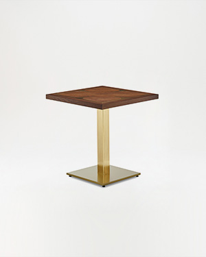 The Cervia Table balances industrial and natural elements effortlessly.CERVIA TABLE