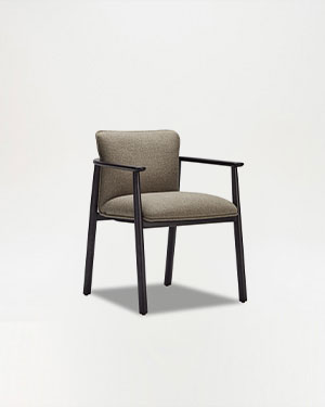 The Carolina Chair, crafted from premium ashwood, harmonizes with nature's elegance.CAROLINA ARMCHAIR