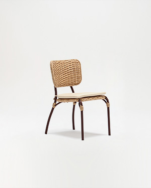 Crafted from lightweight aluminum and adorned with plastic rattan, the Lugan Side Chair effortlessly blends durability and style in a compact design.LUGAN SIDE CHAIR