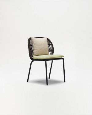 The allure of metal and hand-made rope, creating a chair that embodies tranquility.MORI CHAIR