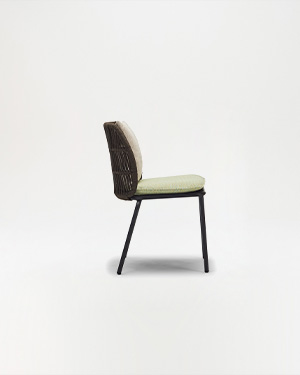 The allure of metal and hand-made rope, creating a chair that embodies tranquility.MORI CHAIR