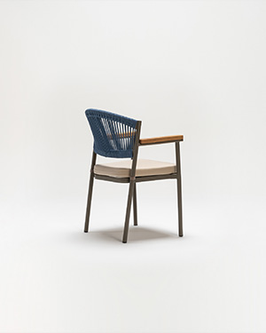 Metal and hand-made rope merge seamlessly, defining a chair that invites you to unwind.NOOK ARMCHAIR