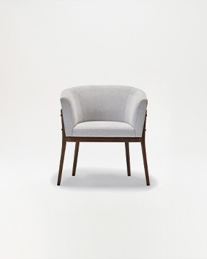 The Osmo Armchair is a masterpiece of craftsmanship, where exquisite ashwood and thoughtful design meet.OSMO ARMCHAIR