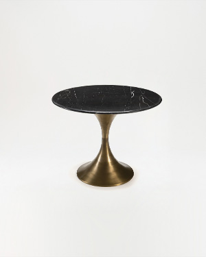 The Pasaro Table is a marriage of industrial chic and opulence.PASARO TABLE