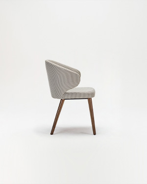 Nola Chair carries the modern essence of the collection inspired by Locanda.REST ARMCHAIR