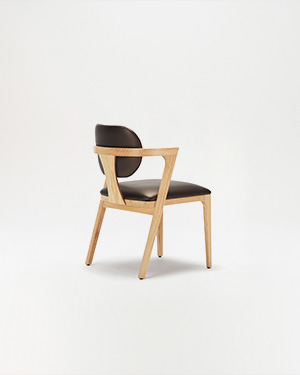 Enriched by wood accents, the design brings a unique aesthetic to spaces.VEEZY ARMCHAIR